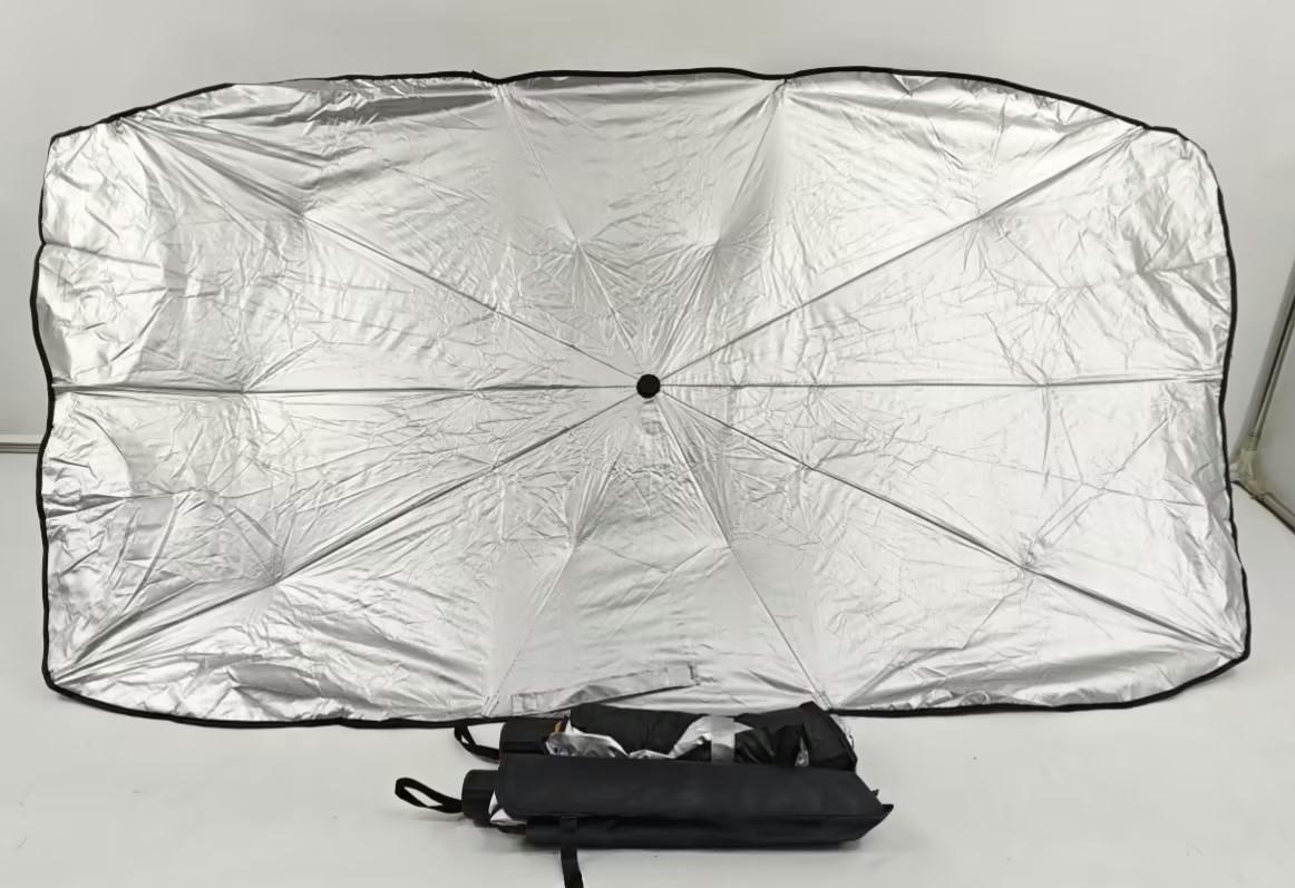 Silver umbrella cover with a black handle on a white background