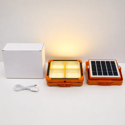 Orange portable light with solar panel and white box on a white background