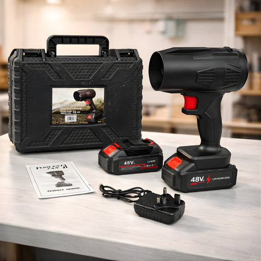Black cordless drill set with case, batteries, and charger on a table.